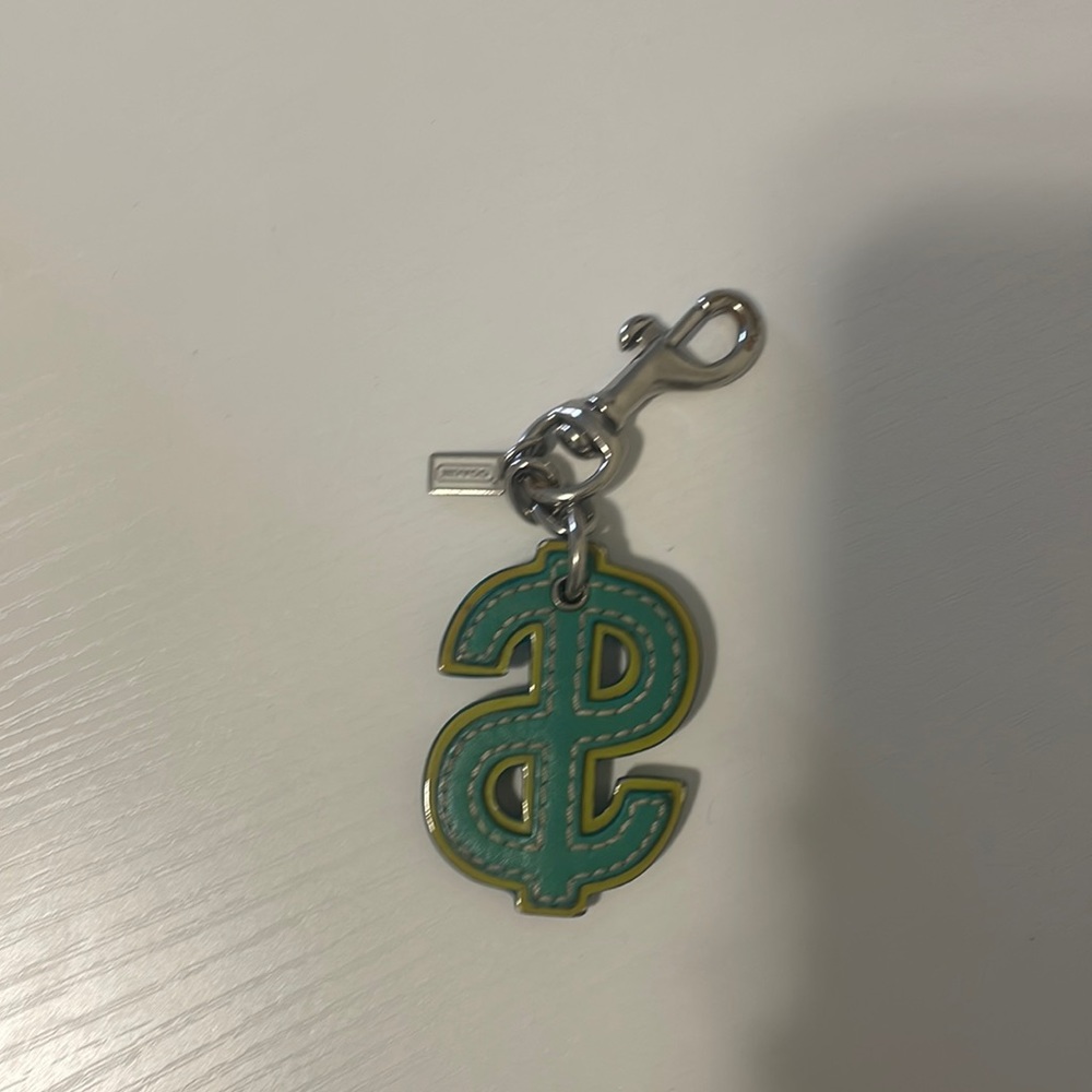 Coach charm